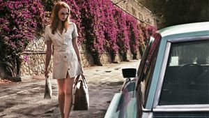 The Lady in the Car with Glasses and a Gun